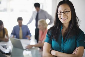 Smiling businesswoman at meeting
